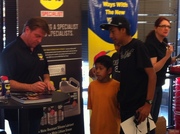 Chip signing autographs for fans