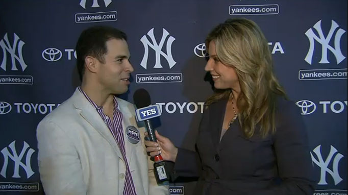 Joe Girardi is joined by wife Kim for a news conference at Yankee