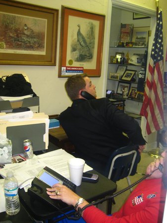 Dustin Olson working the phones in the final hours of a winning campaign.